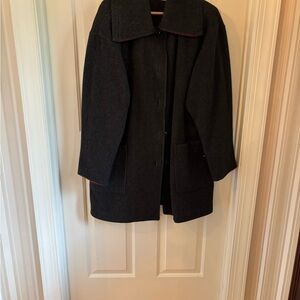 Classic Black Wool Coat with Subtle Red Trim on collar